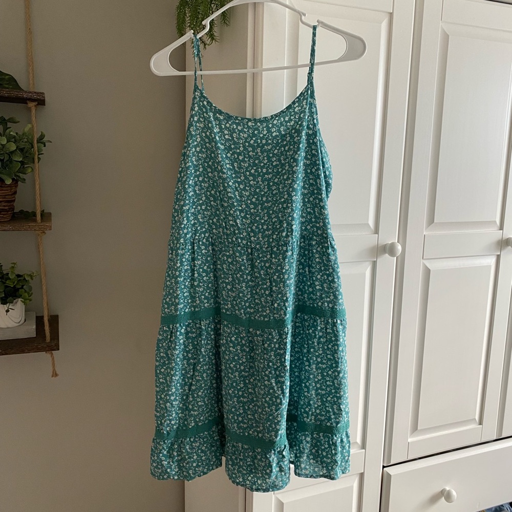 teal flowy dress w/ white floral pattern